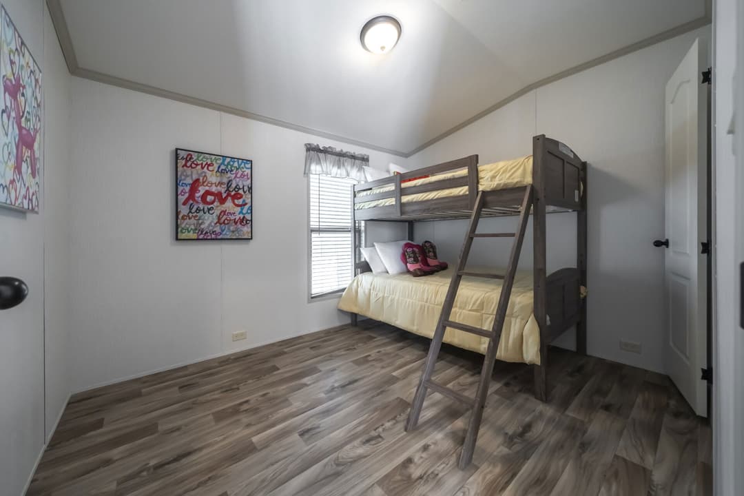 The queen bedroom home features